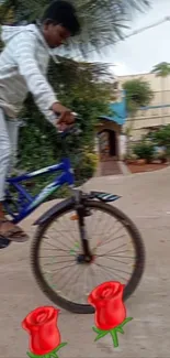 Boy performing bicycle stunt with roses on a sunny day.