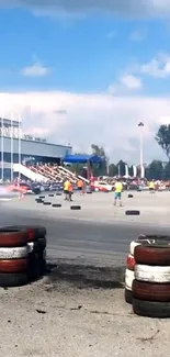 Car drift event with smoke at a bustling racetrack scene.