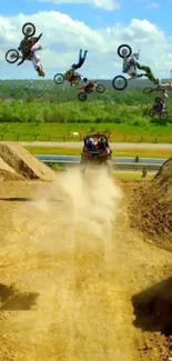 Exciting dirt bike stunt with riders in mid-air against a clear sky.