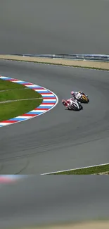 Motorcycle racers navigate a sharp track turn with speed and precision.