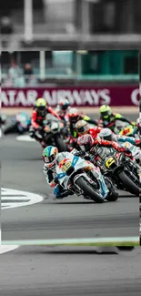 Motorcycle racers speed around a track in an exciting action scene.