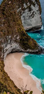 Stunning beach with cliffs and turquoise sea as mobile wallpaper.