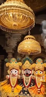 Ornate temple chandeliers with vibrant deity statues.