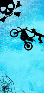 Motorcycle stunt over blue ocean with skull and web.