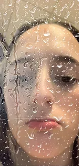 Face behind rainy glass wallpaper for mobile phone.