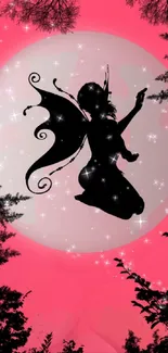 Fairy silhouette on a pink and moonlit fantasy backdrop.