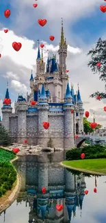 Fairytale castle with reflection over calm water under a bright blue sky.