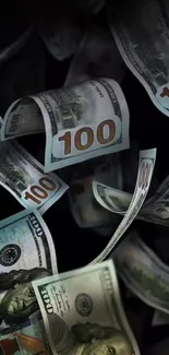 Hundred dollar bills floating in mid-air against a dark backdrop.