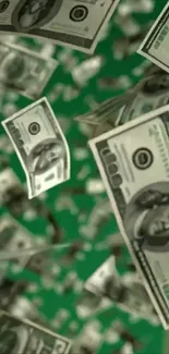 Falling dollar bills on a green backdrop.