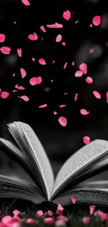 Open book with falling pink petals in a serene setting.