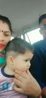 Family enjoying a car ride with smiles and warmth on display.