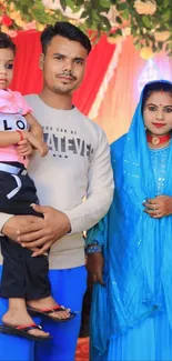 Family portrait in colorful attire during a celebration.