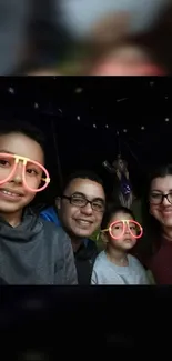 Family enjoying time with neon glasses and smiles.