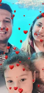 Family photo with floating red hearts on a blue background.