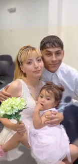 Family portrait with flower bouquet indoors