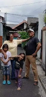 Family posing in a charming urban alleyway.