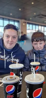 Family enjoying time at a fast-food restaurant.