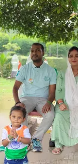 Family enjoying time in a lush green park setting.