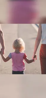 Mobile wallpaper of a family walking hand in hand.