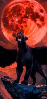 Winged beast roars under a vibrant red moon.