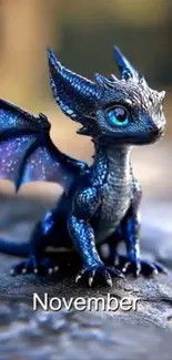 Blue fantasy dragon with wings on a rock