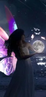 Magical fairy holding the moon at night by the sea.