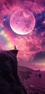 Mystical pink moonlit landscape with rainbow and cliff.