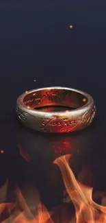 Fiery magic ring with glowing flames on dark background.