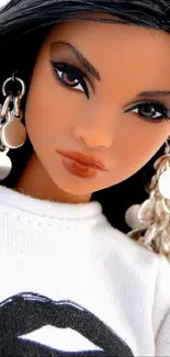 Stylish doll with bold makeup and silver earrings.