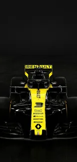 Yellow and black Formula 1 racing car on a dark background wallpaper.