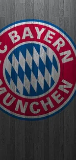 FC Bayern Munich logo on wood texture wallpaper.