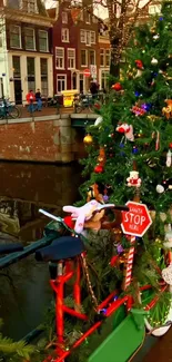 Bicycle decorated with Christmas tree by a canal.