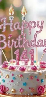 Festive birthday cake with pink decorations.