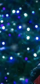 Festive bokeh lights with red bow on a vibrant blue background.