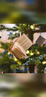 Christmas tree with book ornaments and lights.