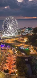 Bournemouth festive skyline with Ferris wheel at sunset.