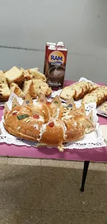 Festive bread display with assorted baked treats on a table.