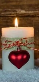 Decorative red and white candles with a rustic wooden background.