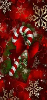 Festive holiday wallpaper with red, green, and gold colors featuring candy canes.