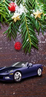 Sports car with festive pine and ornaments on wood.