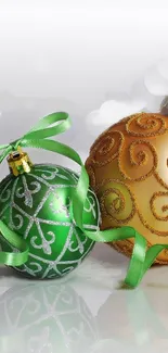 Green and gold Christmas baubles with swirling designs.