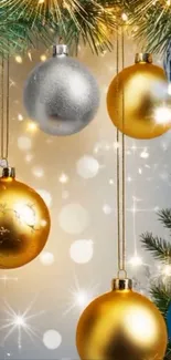 Festive mobile wallpaper featuring golden and silver Christmas baubles.