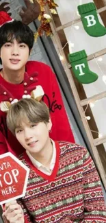 Festive BTS members in Christmas sweaters with decorations.