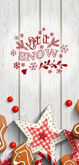 Festive Christmas wallpaper with gingerbread cookies and 'Let it Snow' text.