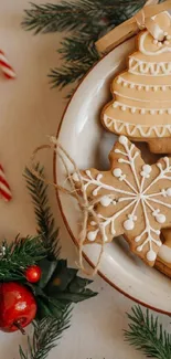 Christmas cookies with pine and candy cane on table.