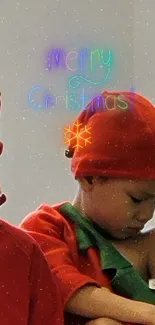 Adorable children dressed as Christmas elves, ideal for festive wallpaper.