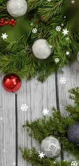 Christmas wallpaper with garland and baubles.