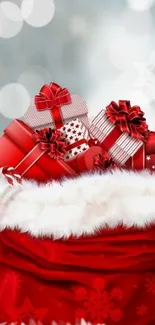 Christmas gift wallpaper with red presents and white snow.