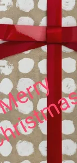 Christmas gift wallpaper with red ribbon and polka dots.