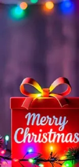 Merry Christmas gift box with colorful lights on a mobile wallpaper.